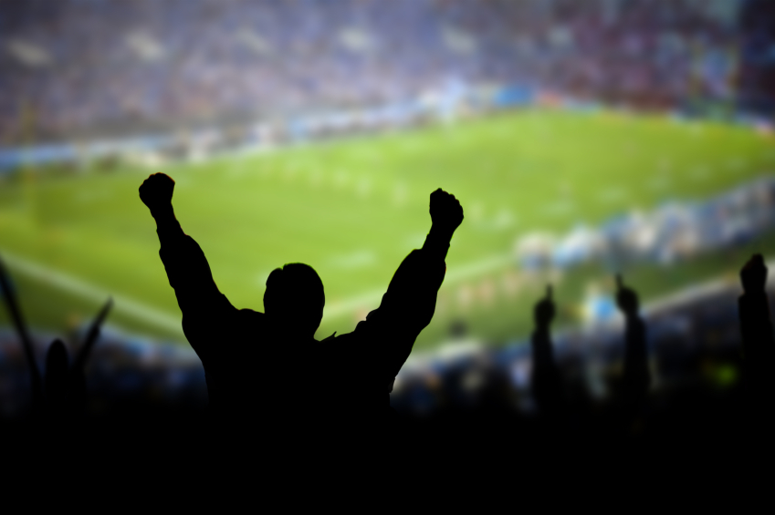 man cheering at game