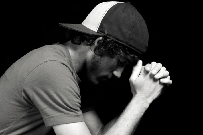 young man praying